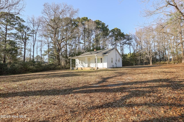 view of yard featuring a porch