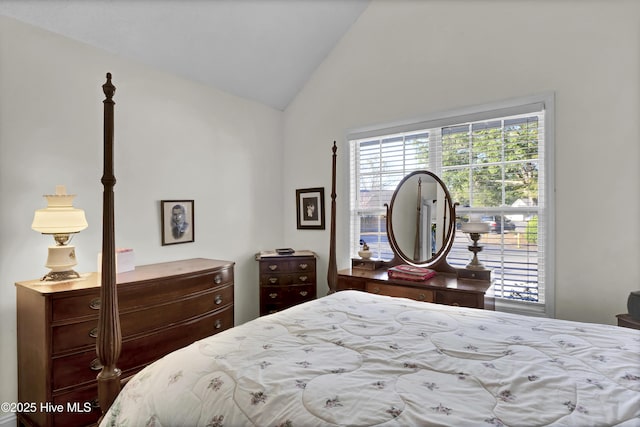 bedroom featuring vaulted ceiling