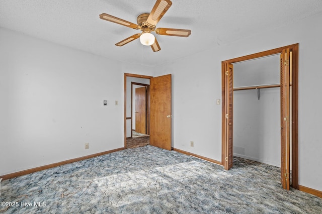 unfurnished bedroom with light carpet, a textured ceiling, a closet, and ceiling fan