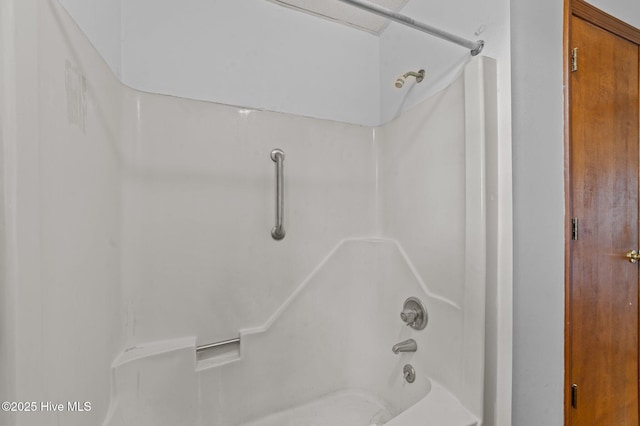 bathroom featuring washtub / shower combination