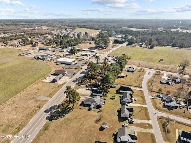 birds eye view of property featuring a rural view