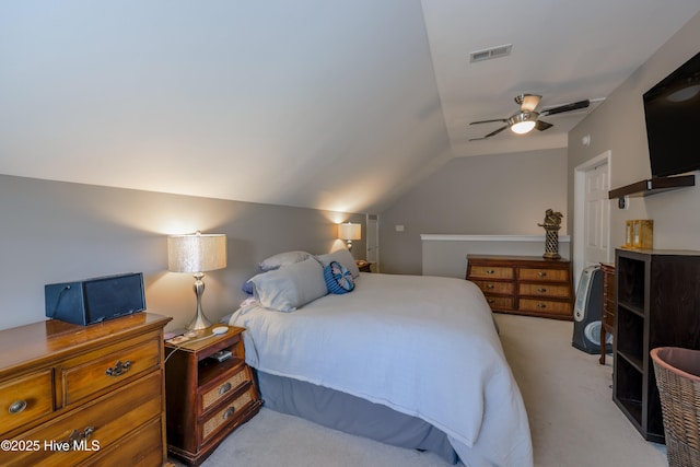 carpeted bedroom featuring ceiling fan and lofted ceiling