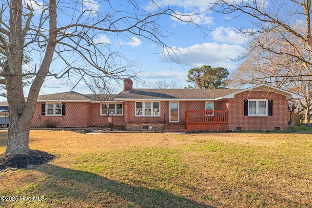 single story home featuring a front yard and a wooden deck