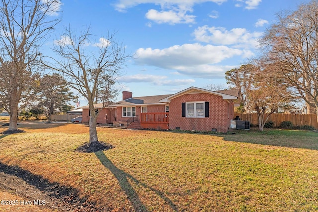 ranch-style home featuring a wooden deck, a front lawn, and central AC unit