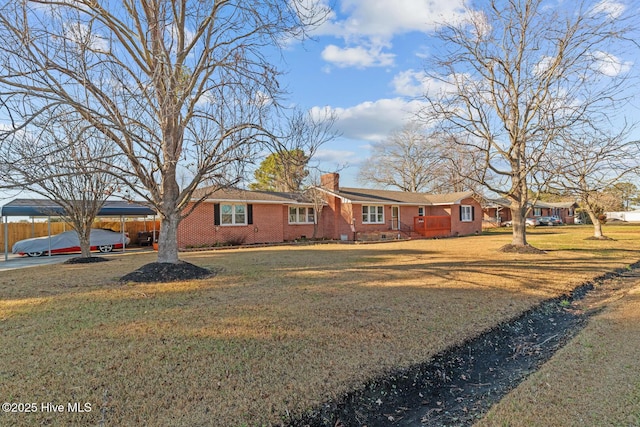 single story home featuring a front lawn