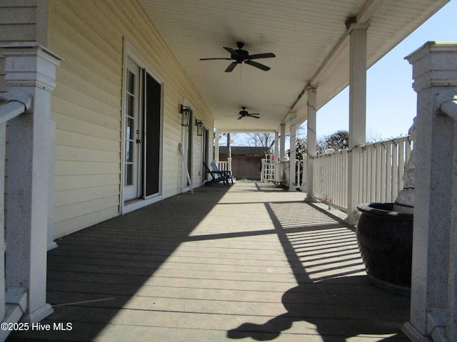 deck featuring ceiling fan and covered porch