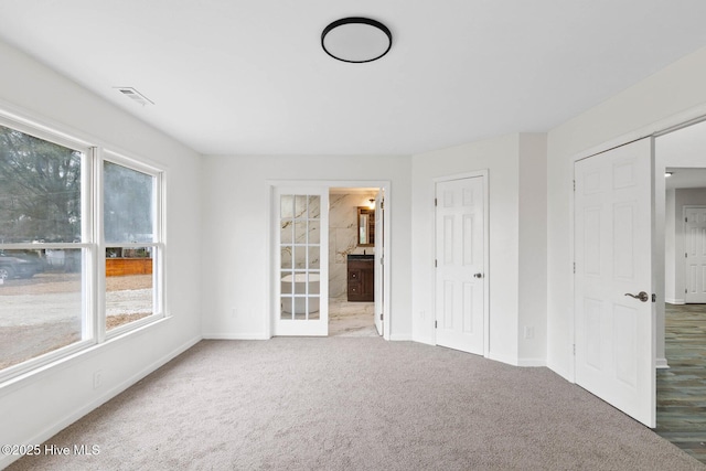 unfurnished room with carpet floors