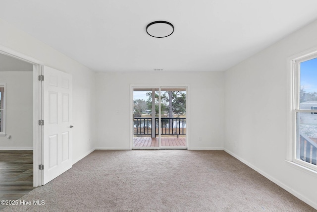 view of carpeted spare room