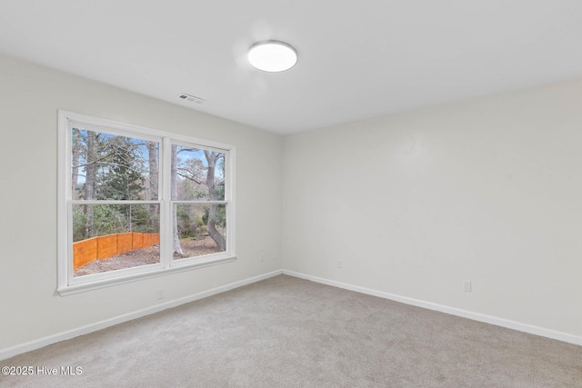 view of carpeted spare room