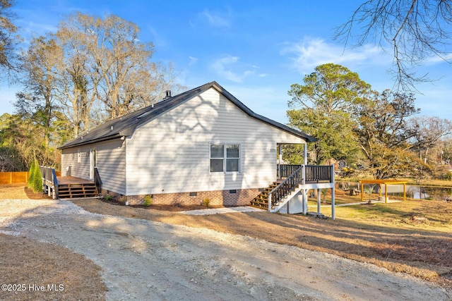 view of home's exterior with a deck