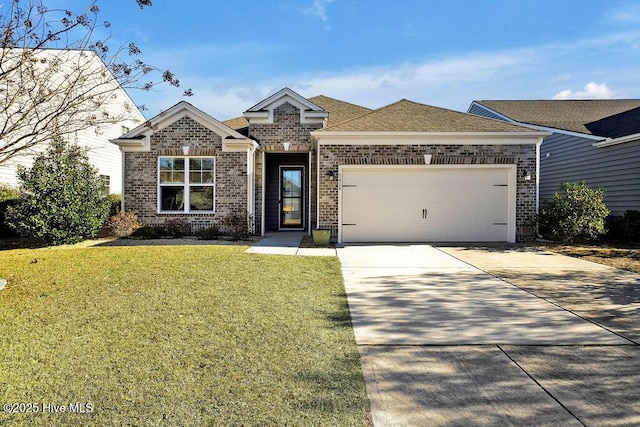 view of front of property with a garage and a front lawn