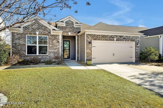 view of front of house featuring a front lawn and a garage