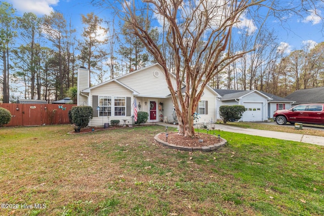 ranch-style house featuring a front lawn and a garage