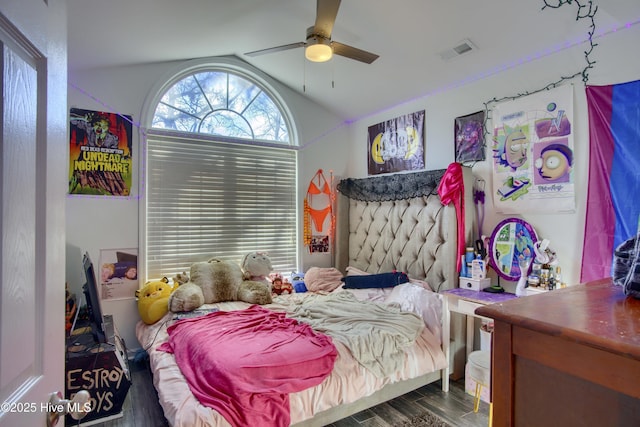 bedroom featuring dark wood-type flooring, ceiling fan, and lofted ceiling