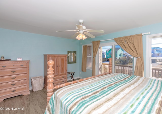 bedroom featuring access to exterior, ceiling fan, and light hardwood / wood-style floors