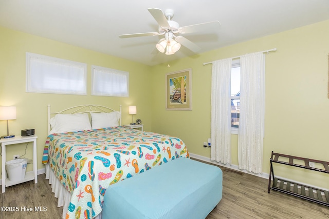 bedroom featuring ceiling fan and light hardwood / wood-style floors