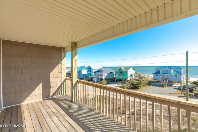 deck featuring a water view