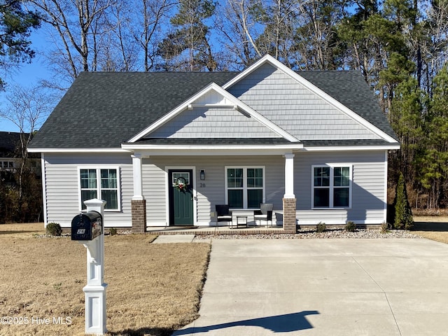 craftsman-style home featuring covered porch