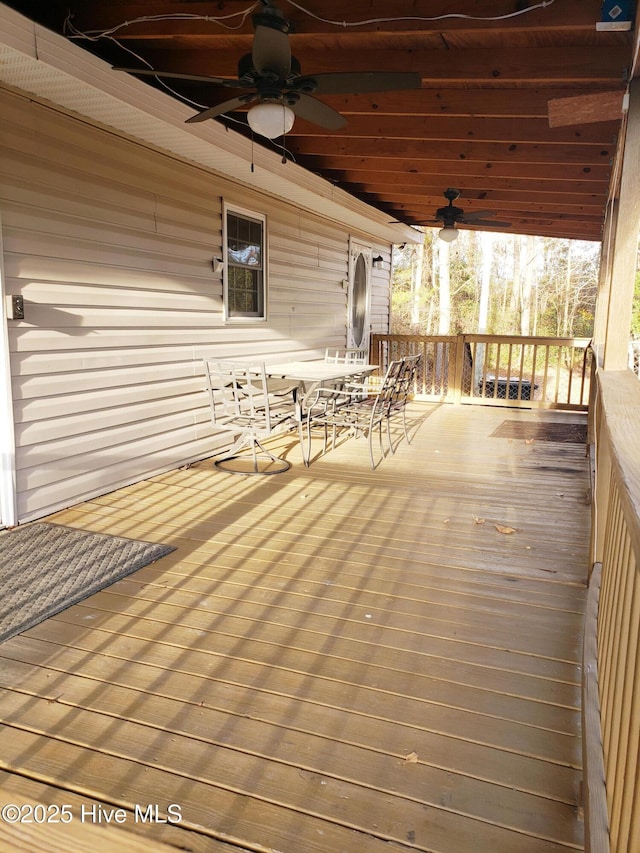 wooden deck with ceiling fan