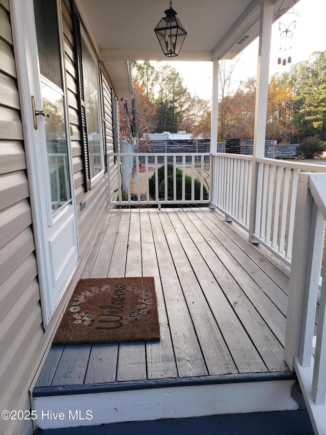 wooden deck featuring a porch