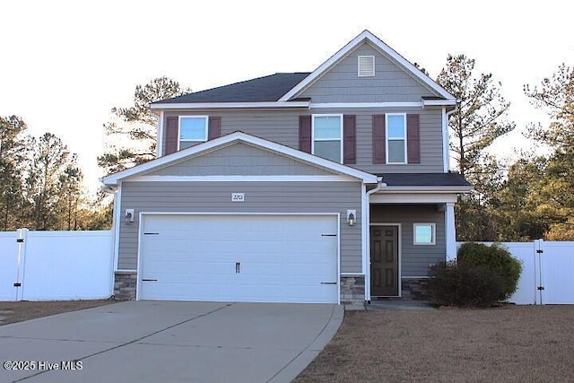 craftsman house featuring a garage