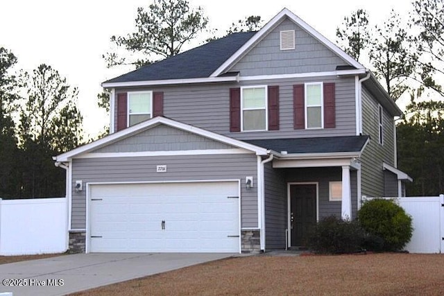 craftsman house featuring a garage