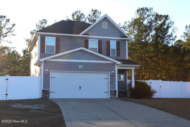 craftsman-style house featuring a garage