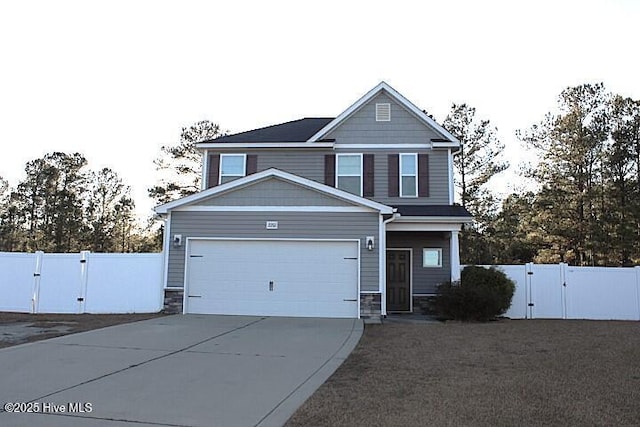 craftsman house with a garage