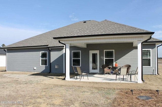 back of property with a patio area