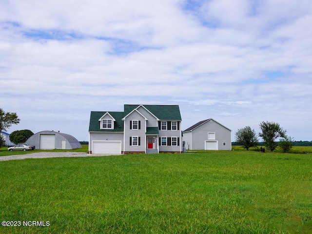 view of front facade featuring a garage and a front lawn