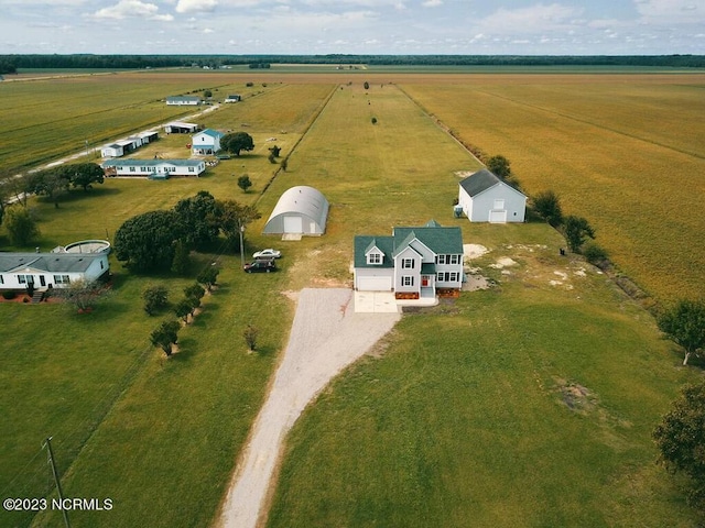 birds eye view of property with a rural view