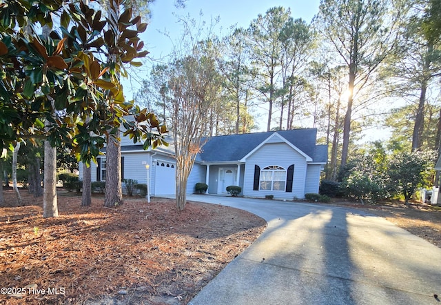 single story home with a garage