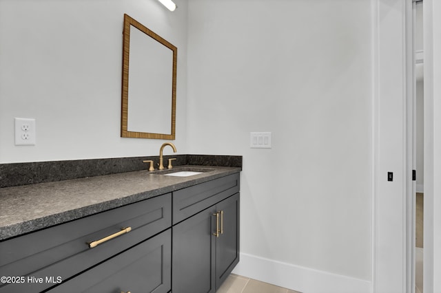 bathroom with vanity and tile patterned flooring