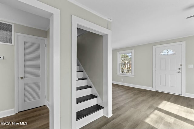 foyer with wood-type flooring