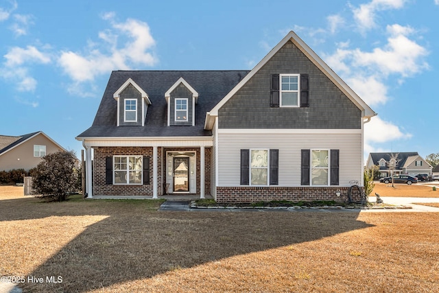 view of front of home with a front lawn