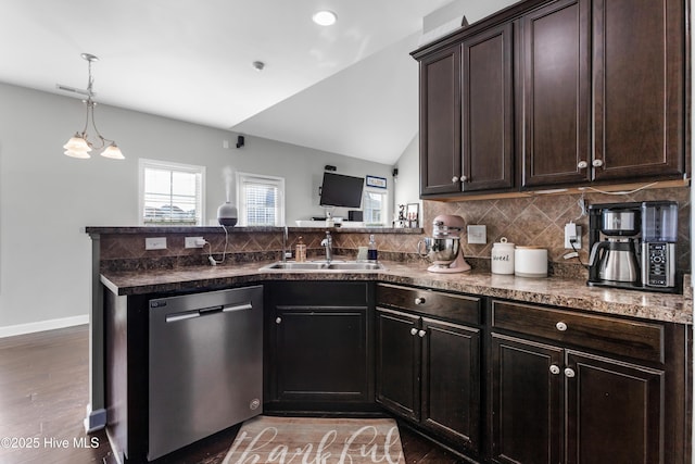 kitchen with tasteful backsplash, dark brown cabinets, sink, a notable chandelier, and dishwasher