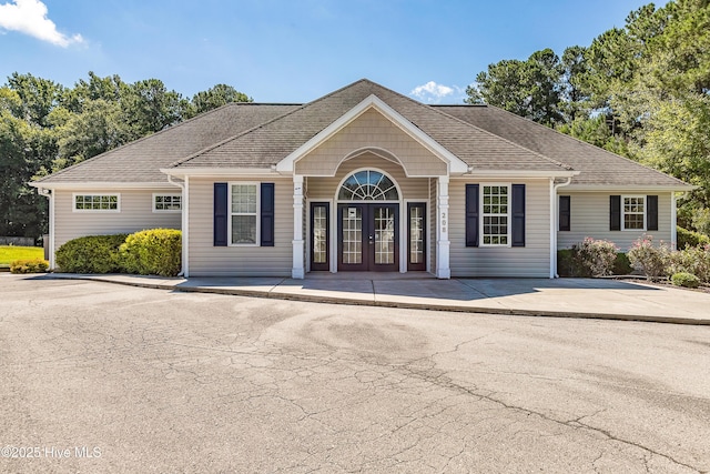 ranch-style house with french doors