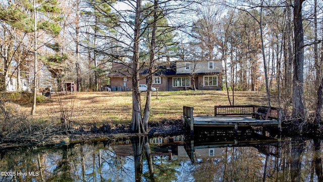 dock area with a water view