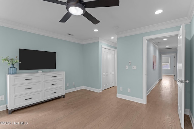 unfurnished living room with ornamental molding, ceiling fan, and light hardwood / wood-style flooring