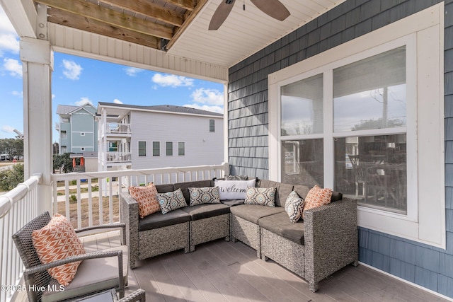 balcony with ceiling fan and an outdoor hangout area