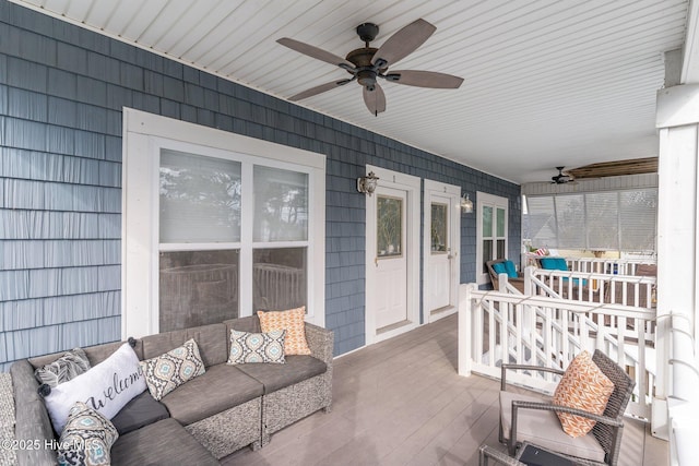 exterior space with ceiling fan, an outdoor hangout area, and covered porch