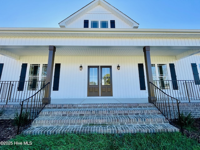 entrance to property with covered porch