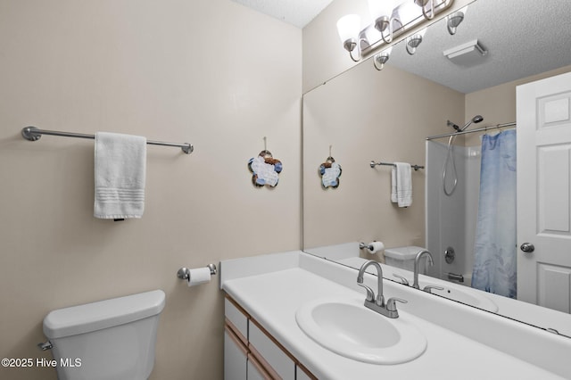 bathroom featuring vanity, a shower with curtain, a textured ceiling, and toilet