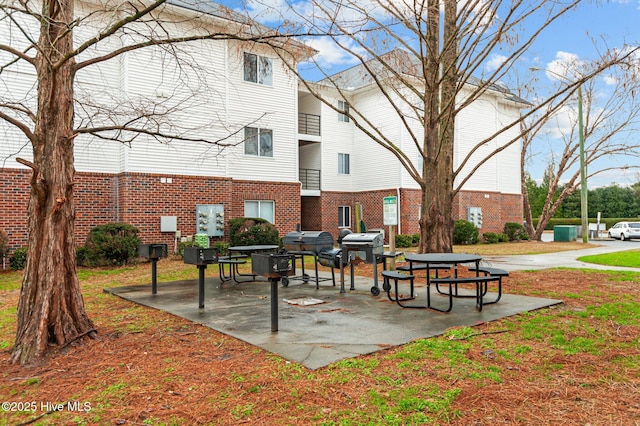 view of community with a patio