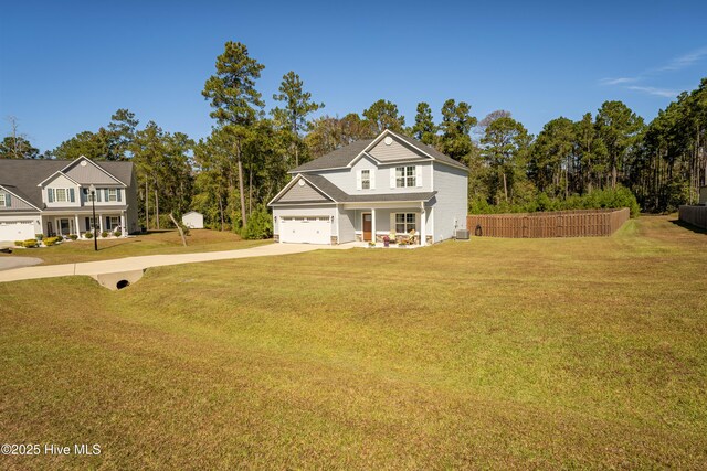 view of side of property featuring a yard and a garage