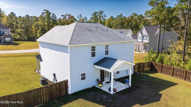 view of front of property featuring a garage and a front lawn