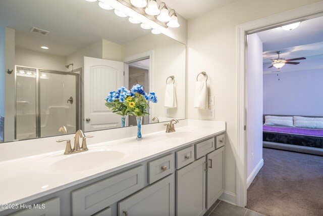 bathroom with vanity and tile patterned floors