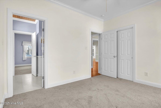 unfurnished bedroom with light carpet and ornamental molding