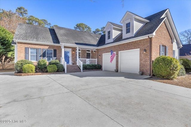 cape cod-style house with a garage