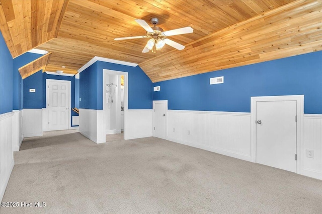 bonus room with light colored carpet, wooden ceiling, and vaulted ceiling